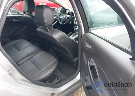 2014 Ford Focus Se z USA, uszkodzony, nr VIN 1FADP3F21EL320009